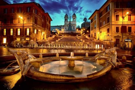 barcaccia fountain in Rome Italy at night