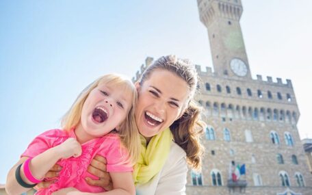 mother and little daughter smiling in Florence