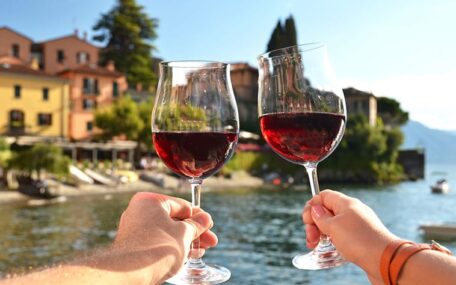 red wine glasses on an Italian lake